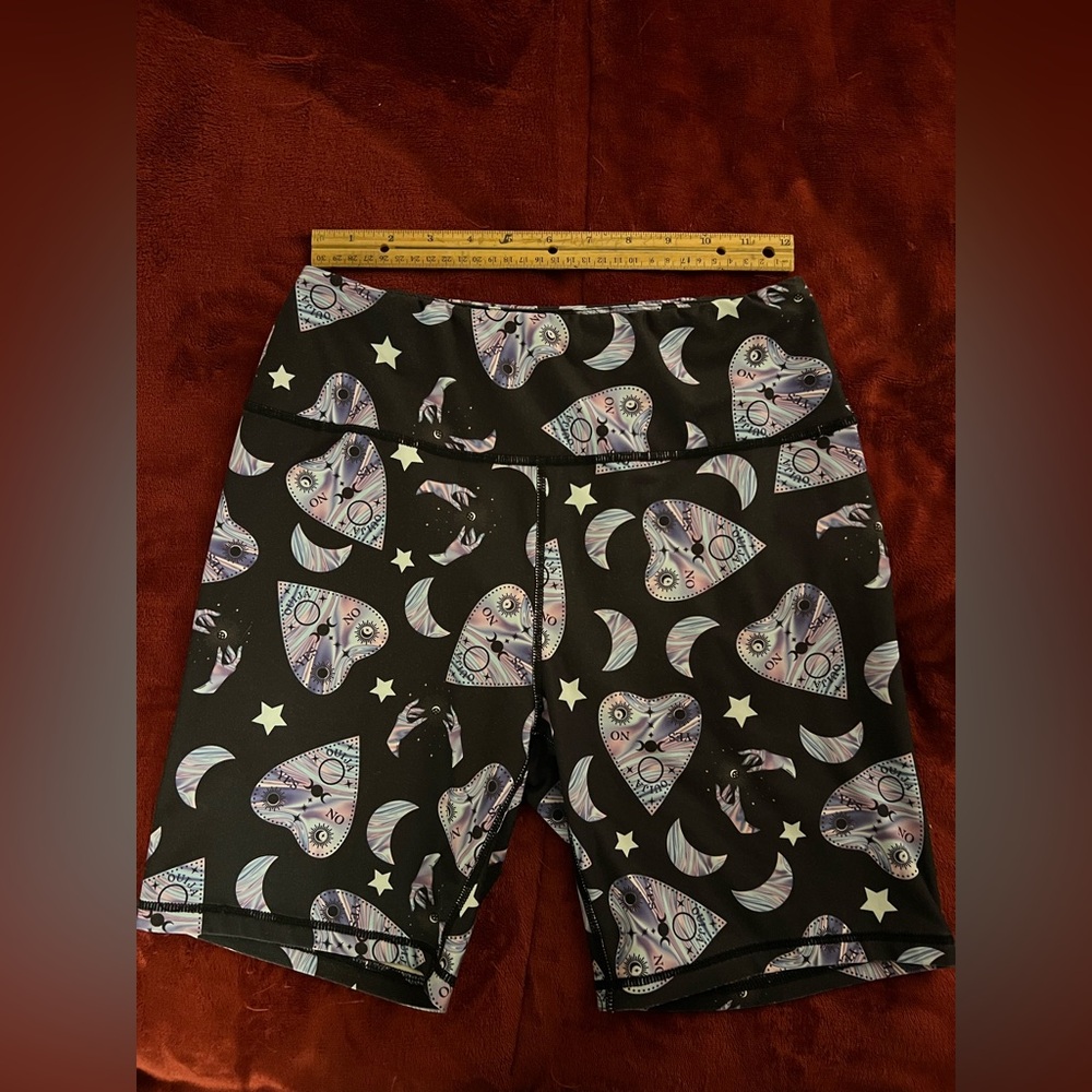 Size M Ouija themed bike shorts